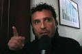 schettino z mikrofonem