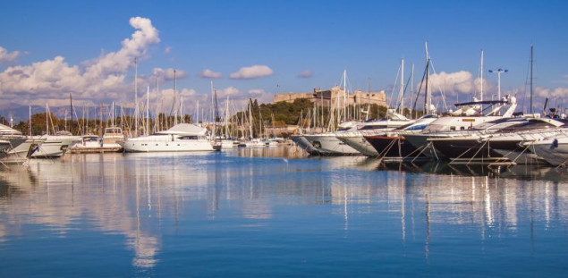 Antibes, France. View yachts moored in the city's port